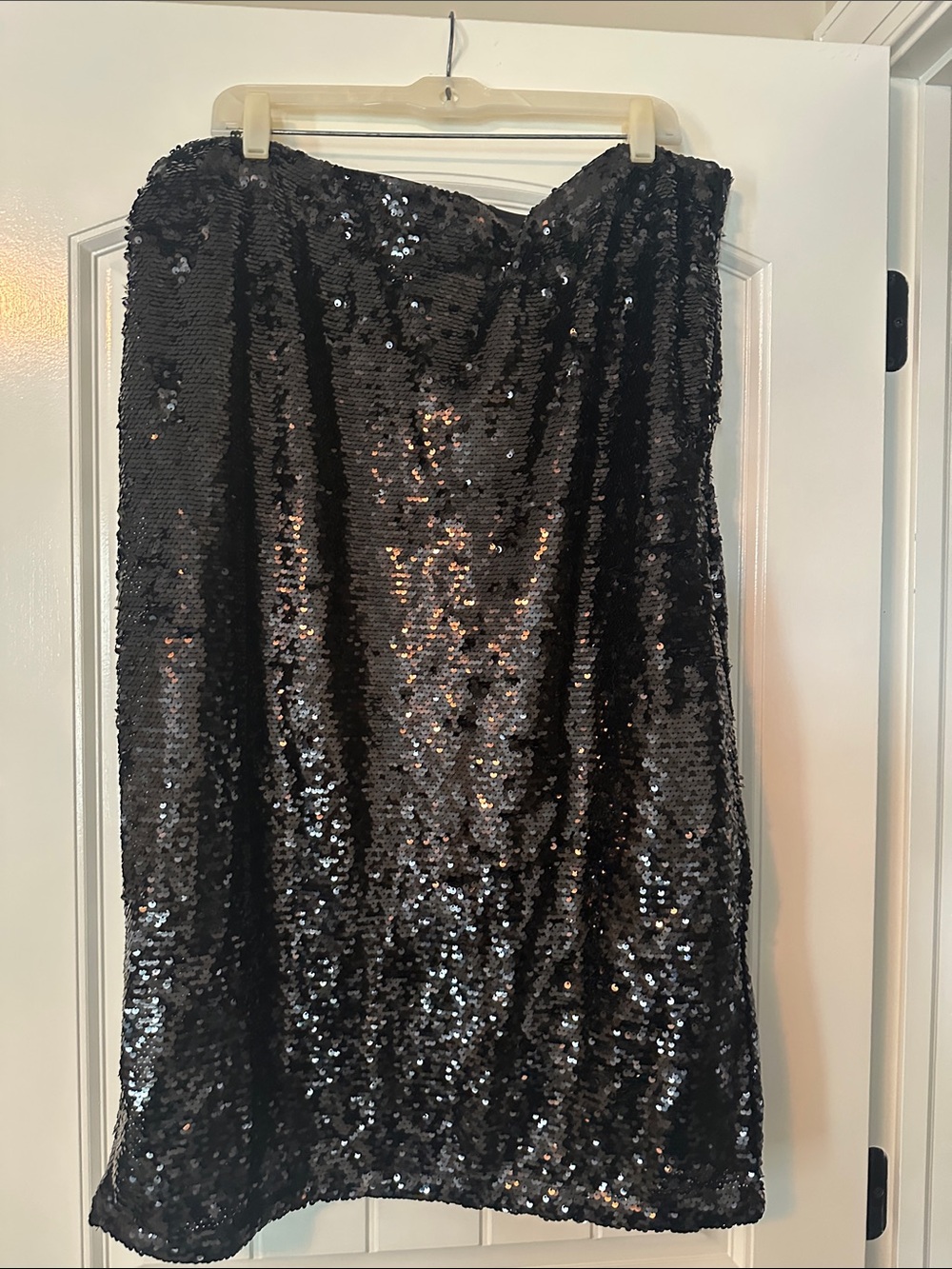 H&M Black Sequin Midi Skirt with side zip closure.